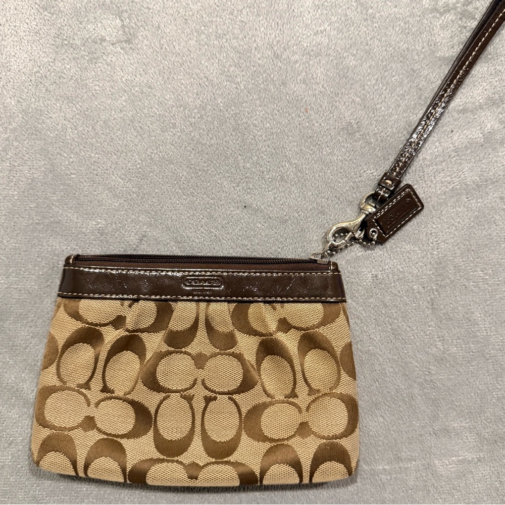Coach brown signature wristlet